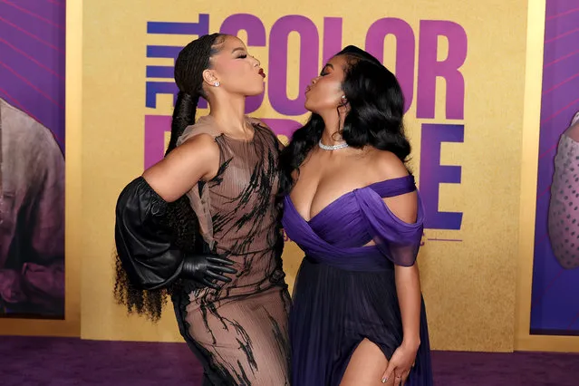 (L-R) American singer-songwriters Chloe Bailey and Gabriella Wilson aka H.E.R. attend the World Premiere of Warner Bros.' “The Color Purple” at Academy Museum of Motion Pictures on December 06, 2023 in Los Angeles, California. (Photo by Leon Bennett/Getty Images)