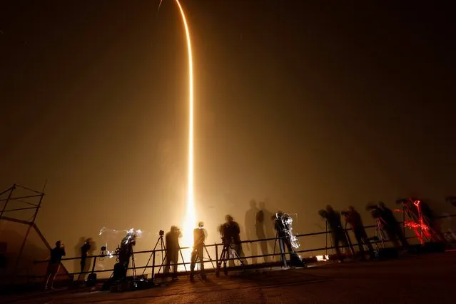 A SpaceX Falcon 9 rocket, carrying the Crew Dragon spacecraft, lifts off on an uncrewed test flight to the International Space Station from the Kennedy Space Center in Cape Canaveral, Florida, U.S., March 2, 2019. (Photo by Mike Blake/Reuters)