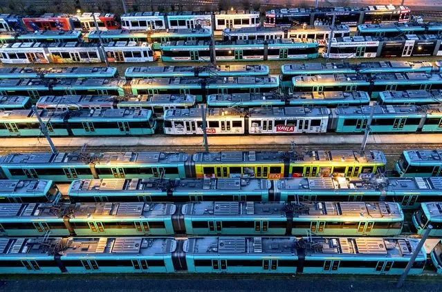 Subways are parked in a subway depot in Frankfurt, Germany, Friday, February 2, 2024, as employees of public transport in Germany went on a one-day warning strike. (Photo by Michael Probst/AP Photo)
