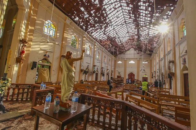 A view of St. Sebastian's Church damaged in blast in Negombo, north of Colombo, Sri Lanka, Sunday, April 21, 2019.  More than hundred were killed and hundreds more hospitalized with injuries from eight blasts that rocked churches and hotels in and just outside of Sri Lanka's capital on Easter Sunday, officials said, the worst violence to hit the South Asian country since its civil war ended a decade ago. (Photo by Chamila Karunarathne/AP Photo)