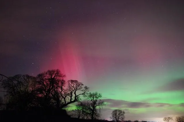 The aurora borealis is seen in the night sky over Cumbria in northwest England in this picture provided by Jonathan Cooper February 27, 2014. (Photo by Jonathan Cooper/Reuters)