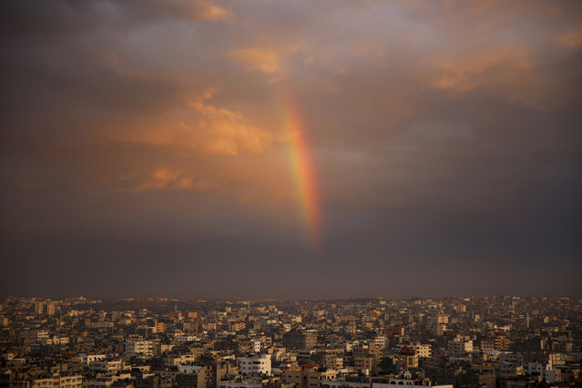 A rainbow shines in the sky above the city following a rainstorm, in Beit Lahiya City, Gaza Strip, Thursday, December 8, 2016. (Photo by Adel Hana/AP Photo)