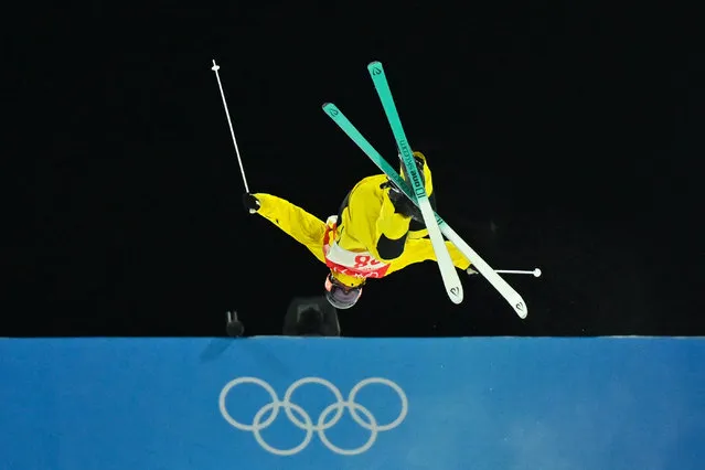 Kazakhstan's Dmitriy Reikherd competes in the freestyle skiing men's moguls qualification during the Beijing 2022 Winter Olympic Games at the Genting Snow Park A & M Stadium in Zhangjiakou on February 5, 2022. (Photo by Ben Stansall/AFP Photo)