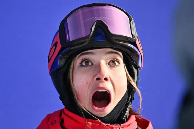 China's Gu Ailing Eileen reacts after watching her score as she competes in the freestyle skiing women's freeski halfpipe final run during the Beijing 2022 Winter Olympic Games at the Genting Snow Park H & S Stadium in Zhangjiakou on February 18, 2022. (Photo by Marco Bertorello/AFP Photo)