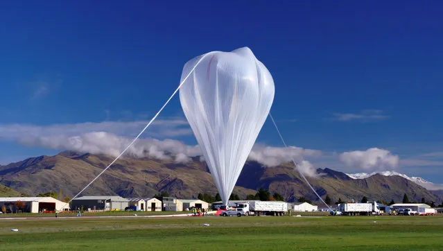 A NASA super pressure balloon is prepared for launch from Wanaka Airport on New Zealand's South Island, May 17, 2016. (Photo by Bill Rodman/Reuters/NASA)