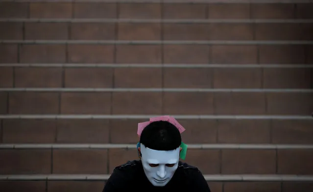 A man wearing a mask attends an anti-government protest in Hong Kong, China, October 18, 2019. (Photo by Umit Bektas/Reuters)