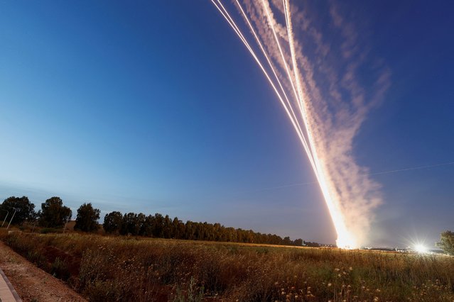 An Iron Dome launcher fires an interceptor missile as rockets are fired from Gaza, in Sderot, Israel on May 10, 2023. (Photo by Ammar Awad/Reuters)