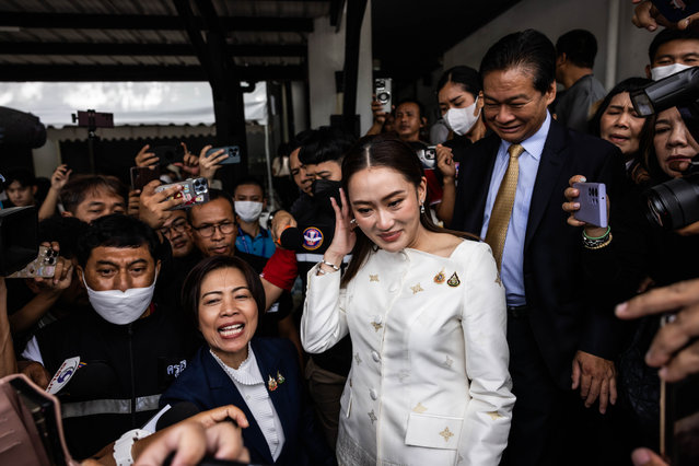 Paetongtarn Shinawatra, Thailand's prime minister, greets supporters after a news conference following a royal endorsement in Bangkok, Thailand, on Sunday, August 18, 2024. The youngest daughter of former Thai leader Thaksin Shinawatra won a parliamentary vote to become the Southeast Asian nations next prime minister, capping a tumultuous period that saw a court oust her predecessor and dissolve the top opposition party. (Photo by Andre Malerba/Bloomberg)