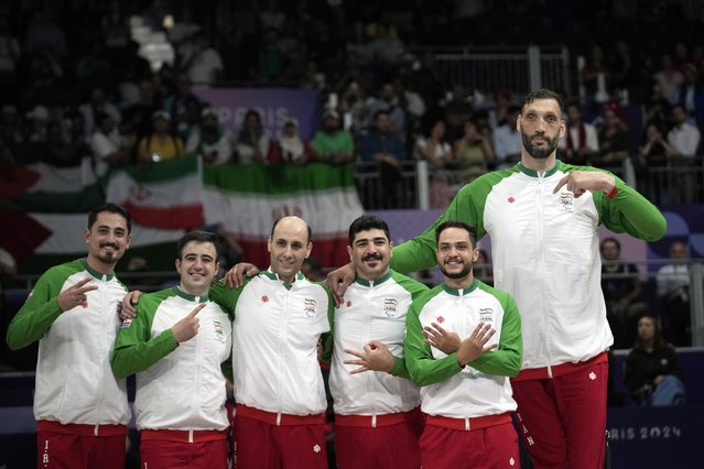 Iran players celebrate after winning the men's Sitting Volleyball Gold Medal Match against Bosnia and Herzegovina, at the 2024 Paralympics, Friday, September 6, 2024, in Paris, France. (Photo by Christophe Ena/AP Photo)