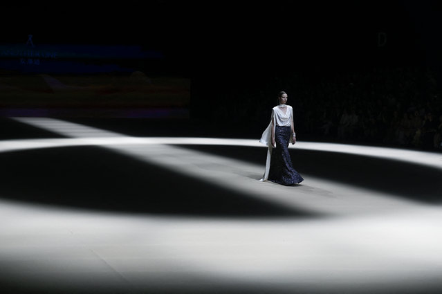 A model displays a creation from the Another One collection by Xiaoming Deng during the China Fashion week in Beijing on September 10, 2024. (Photo by Wang Zhao/AFP Photo)