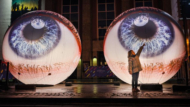 The Oculus installation outside the Grillo Theatre in Essen, Germany on October 2, 2024, whose light festival features 16 large installations across the city. (Photo by Alamy Live News)