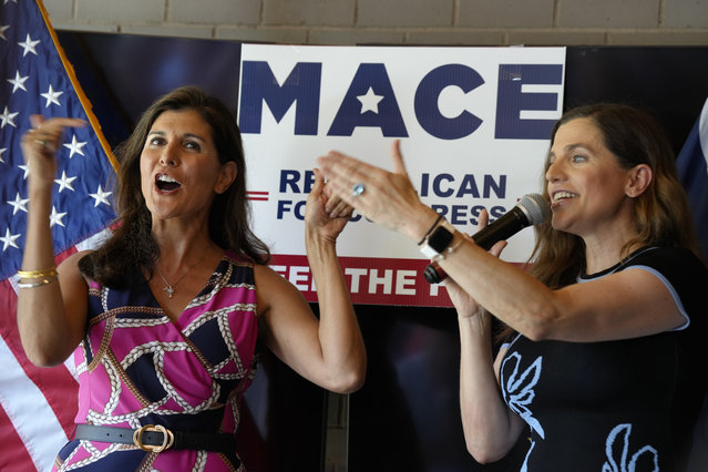 Former South Carolina Gov. Nikki Haley, left, cheers alongside U.S. Rep. Nancy Mace during a campaign rally ahead of South Carolina's GOP primary elections, Sunday, June 12, 2022, in Summerville, S.C. (Photo by Meg Kinnard/AP Photo)