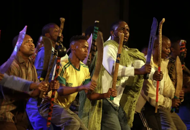 In this photo taken Thursday, Aug. 13, 2015, Mavuso Magabane, centre right, with fellow actors perform in the musical “Marikana” in Pretoria, South Africa. South Africans sing and dance when they mourn, which is why a musical is a fitting way to commemorate the police shootings of striking miners three years ago, says the lead actor of “Marikana – The Musical”.  (Photo by Themba Hadebe/AP Photo)