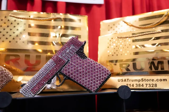 A diamante gun offered for sale by USATumpStore sit on display at the Conservative Political Action Conference (CPAC) in Dallas on August 5, 2022. (Photo by Zach D. Roberts/NurPhoto/Rex Features/Shutterstock)