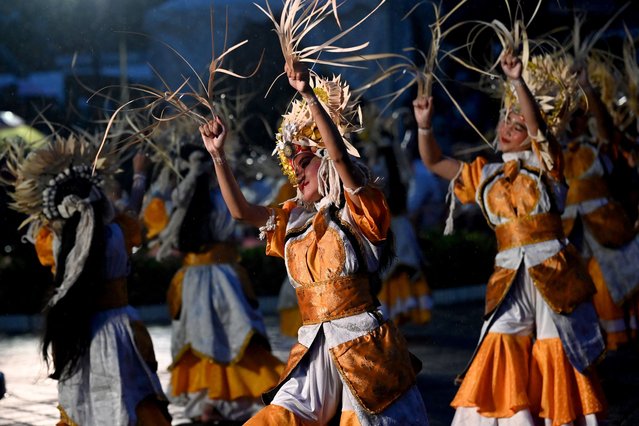 Balinese traditional dancers perform during the dance of releasing the sun 2024, welcoming the sun 2025 a New Year's Eve celebration in Denpasar on Indonesia's resort island of Bali on December 31, 2024. (Photo by Sonny Tumbelaka/AFP Photo)