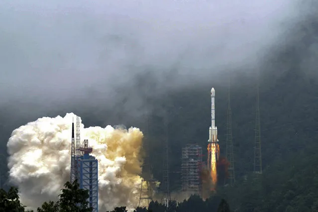 In this photo released by Xinhua News Agency, a rocket carrying the last satellite of the Beidou Navigation Satellite System blasts off from the Xichang Satellite Launch Center in southwest China's Sichuan Province, Tuesday, June 23, 2020. China launched the final satellite in its Beidou constellation that emulates the U.S. Global Positioning System, marking a further step in the country's advance as a major space power. (Photo by Xue Chen/Xinhua News Agency via AP Photo)