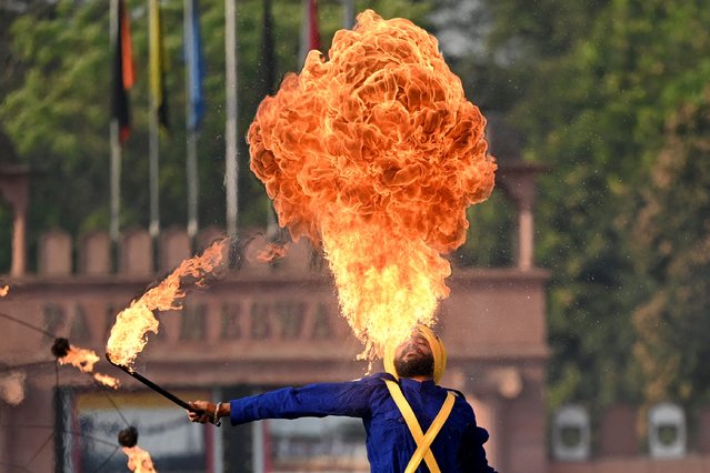 A Nihang or Sikh warrior performs “Gatka” an ancient form of Sikh martial arts, during an Indian Army activity display at the Officers Training Academy in Chennai on March 7, 2025. (Photo by R.Satish Babu/AFP Photo)