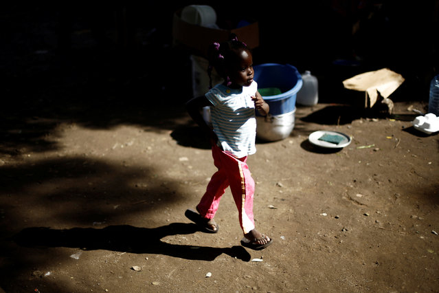 An African migrant child walks in a makeshift camp at the border between Costa Rica and Nicaragua, in Penas Blancas, Costa Rica, September 8, 2016. (Photo by Juan Carlos Ulate/Reuters)