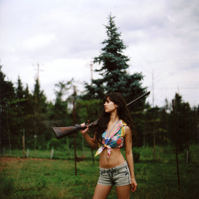 “Aviva and a big gun”. (Photo by Michelle Karpman)