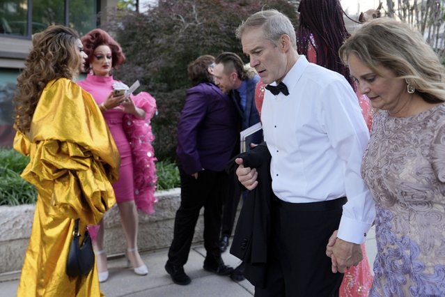 Rep. Jim Jordan, R-Ohio, and Polly Jordan walk past Tara Hoot, Ricky Rosé, Vagenesis and Maria Con Carne outside the Kennedy Center, to attend Les Miserables, Wednesday, June 11, 2025, in Washington, on the night that President Donald Trump and first lady Melania Trump were also attending. (Photo by Julia Demaree Nikhinson/AP Photo)