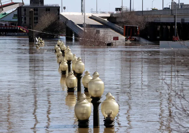 Water covers downtown streets after the Ohio River flooded in Louisville, Kentucky, U.S., February 26, 2018. (Photo by John Sommers II/Reuters)