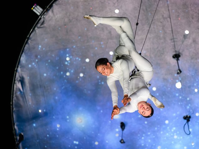 Members of the Spanish Zenit Aerial Ballet present their performance titled Aria at the 31st Sziget (Island) Festival on Shipyard Island, Budapest, Hungary, late 07 August 2025. (Photo by Tamas Vasvari/EPA)