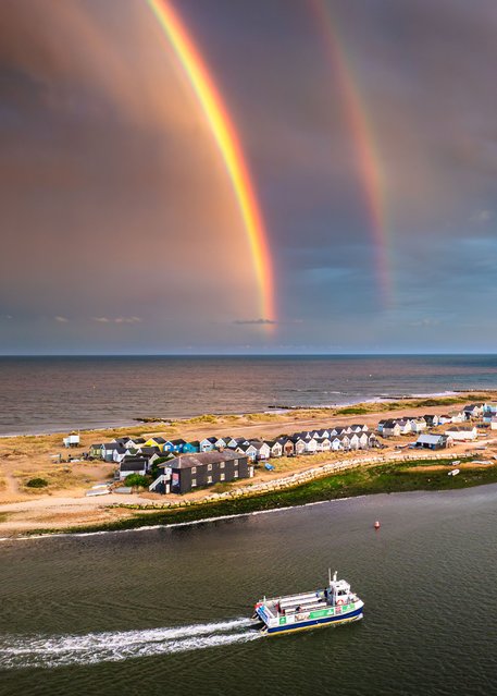 A spectacular double rainbow over the beach huts on Mudeford Sandbank, Dorset, UK, captured by photographer Will Evans on August 28, 2025. (Photo by Will Evans/SnapPhotography via Bournemouth News)