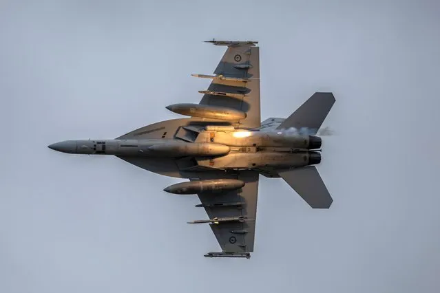 A RAAF F/A-18F Super Hornet flying during an Australian Defence Force showcase shoots out mock missles on February 28, 2023 in Avalon, Australia. (Photo by Asanka Ratnayake/Getty Images)