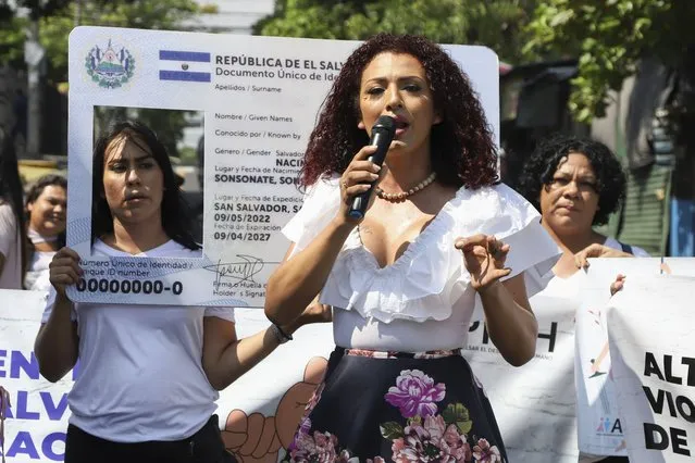 Arantza Rivas, a transgender woman, speaks during a protest in front of Congress demanding the approval of a law that would allow a person to change name and gender on identity documents, marking the International Day Against Homophobia, Biphobia and Transphobia, a global call to protect the rights of LGBTQI+ people, in San Salvador, El Salvador, Wednesday, May 17, 2023. (Photo by Salvador Melendez/AP Photo)