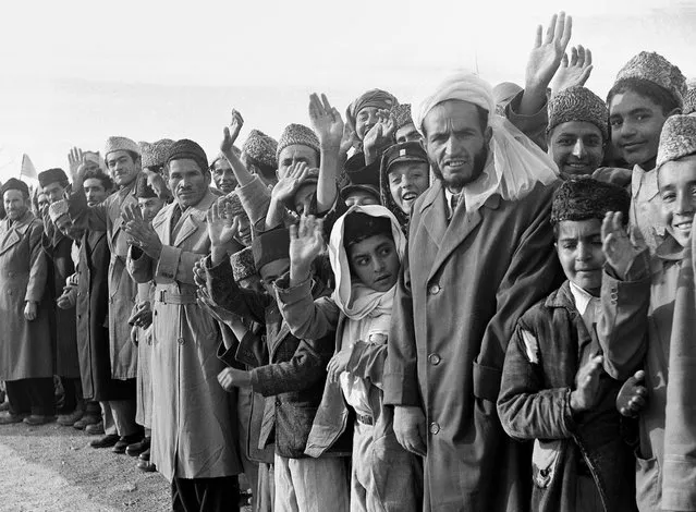 Residents of Afghanistan line the route of U.S. President Dwight Eisenhower's tour in Kabul, Afghanistan, on December 9, 1959. (Photo by AP Photo via The Atlantic)