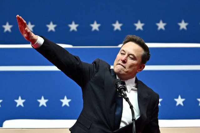 Tesla and SpaceX CEO Elon Musk gestures as he speaks during the inaugural parade inside Capitol One Arena, in Washington, DC, on January 20, 2025. (Photo by Angela Weiss/AFP Photo)