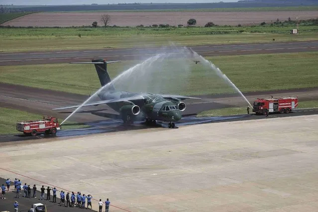 The new KC-390 military cargo jet, is pictured in Gaviao Peixoto city near Sao Paulo February 3, 2015. Embraer's new military cargo jet flew for the first time on Tuesday and the planemaker is making progress on collecting late government payments in the next few months, the company's defense chief said in an interview. (Photo by Reuters/EMBRAER)