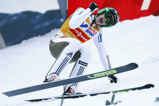 Slovenia's Peter Prevc celebrates after winning the third stage of the 64th four hills ski jumping tournament in Innsbruck, Austria, Sunday, January 3, 2016. (Photo by Matthias Schrader/AP Photo)