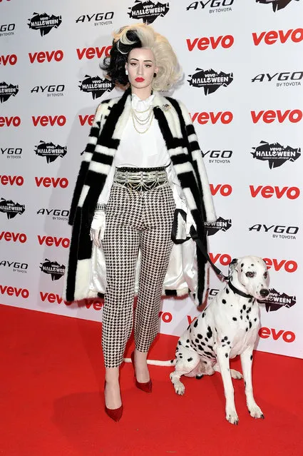 Iggy Azalea dressed as Cruella de Vil attends the VEVO Halloween showcase at The Oval Space on October 31, 2013 in London, England. (Photo by Gareth Cattermole/Getty Images)
