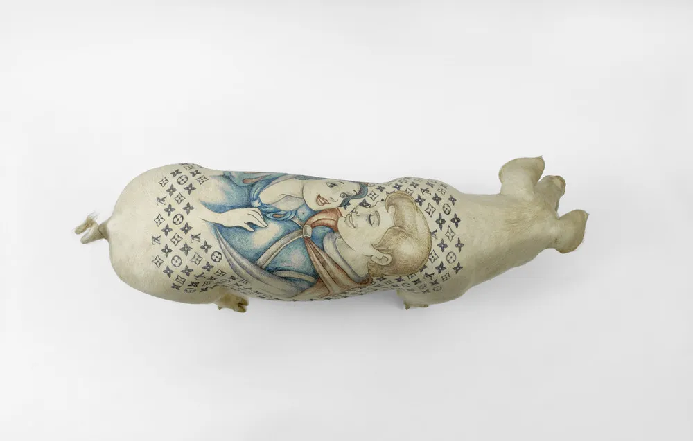 Tattooing Pigs by Wim Delvoye 