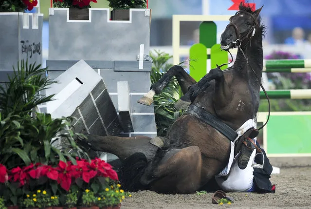 Michal Michalik of Czech Republic during the men's riding show jumping event of the modern pentathlon competition at the Beijing 2008 Olympic Games, August  2008. (Photo by Desmond Boylan/Reuters)