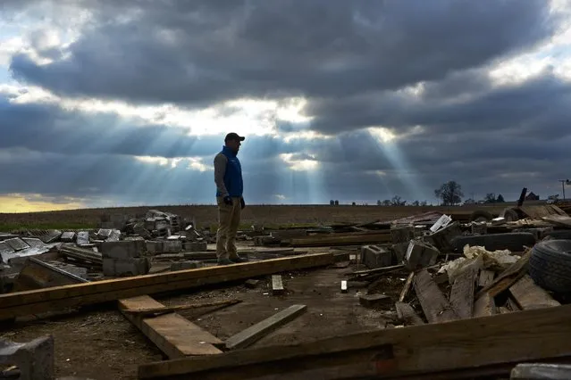 The Weather Channel's on-camera meteorologist Mike Bettes reports from Fairdale, Ill., on Friday, April 10, 2015 after the devastating tornado outbreak on Thursday, April 9, 2015. (Matt Marton/AP Images for The Weather Channel)