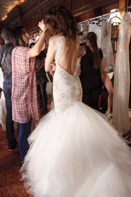 A model prepares during the Galia Lahav Bridal Runway Show Spring/Summer 2016 – Backstage/Front Row at Villard at the Palace Hotel on April 18, 2015 in New York City. (Photo by Thos Robinson/Getty Images for Galia Lahav)