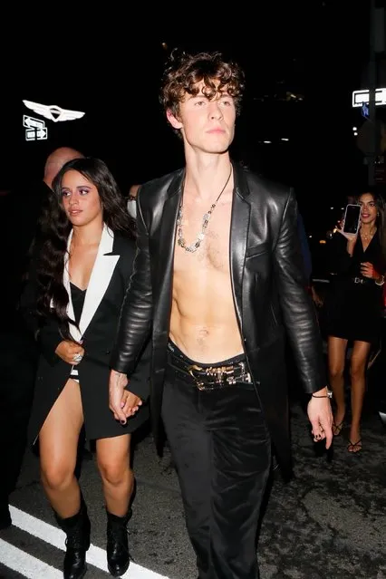 Canadian singer Shawn Mendes and girlfriend, Cuban-born American singer and songwriter Camila Cabello coordinate outfits arriving at a Met Gala after-party in New York on September 14, 2021. (Photo by Backgrid USA)