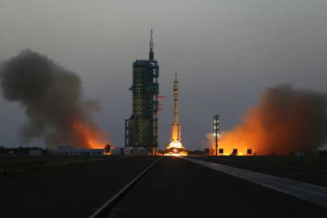 Shenzhou-11 manned spacecraft carrying astronauts Jing Haipeng and Chen Dong blasts off from the launchpad in Jiuquan, China, October 17, 2016. (Photo by Li Jin/Reuters)
