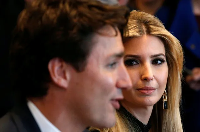 Ivanka Trump looks at Canadian Prime Minister Justin Trudeau (L) during U.S. President Donald Trump's roundtable discussion on the advancement of women entrepreneurs and business leaders at the White House in Washington February 13, 2017. (Photo by Kevin Lamarque/Reuters)