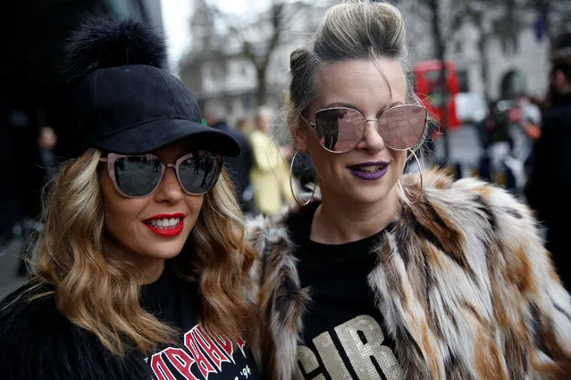 Fashion writers Vered Horen and Shiri Wizner pose for a portrait during London Fashion Week in London, Britain February 21, 2017. (Photo by Neil Hall/Reuters)