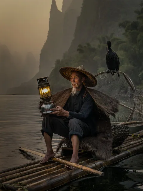 “Cormorant Fisherman”. A quasi studio portrait. Photo location:  Yangshuo, China. (Photo and caption by Carlos Ribas Monteiro/National Geographic Photo Contest)