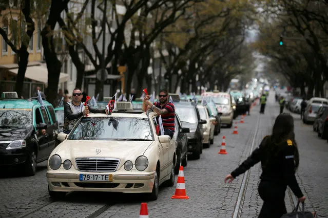 Taxi drivers protest against Uber Technologies Inc. in Lisbon, Portugal April 29, 2016. (Photo by Rafael Marchante/Reuters)