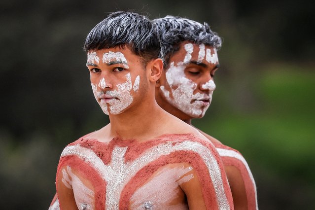 Australian Indigenous performers adorned in traditional body paint stand on Coogee Beach as they prepare to perform in the annual Koojay Corroboree as part of National Reconciliation Week in Sydney on May 31, 2024. (Photo by David Gray/AFP Photo)
