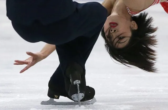 Gold medallists China' s Sui Wenjing and Han Cong compete in the pairs free skating event at the ISU World Figure Skating Championships in Helsinki, Finland on March 30, 2017. (Photo by Grigory Dukor/Reuters)