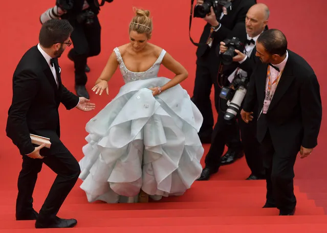 US actress Blake Lively poses arrives on May 13, 2016 for the screening of the film “Ma Loute (Slack Bay)” at the 69th Cannes Film Festival in Cannes, southern France. (Photo by Antonin Thuillier/AFP Photo)