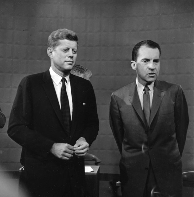 Presidential candidates Sen. John F. Kennedy, left, and Vice President Richard M. Nixon are shown following their nationally televised first of four presidential debates at a television studio in Chicago, Ill., September 26, 1960. (Photo by AP Photo)