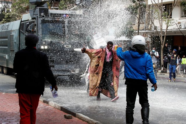 Police use water cannons to disperse protesters during a demonstration against Kenya's proposed finance bill 2024/2025 in Nairobi, Kenya, on June 25, 2024. (Photo by Monicah Mwangi/Reuters)