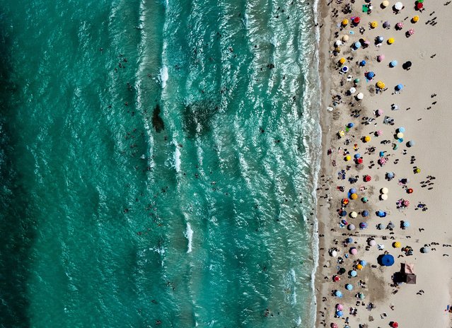 An aerial view of the Ilica Beach, which is about 1,200 meters long, in Izmir, Turkiye on July 17, 2024. Izmir's touristic district Cesme hosted local and foreign tourists who took advantage of the Eid al-Adha. (Photo by Berkan Cetin/Anadolu via Getty Images)